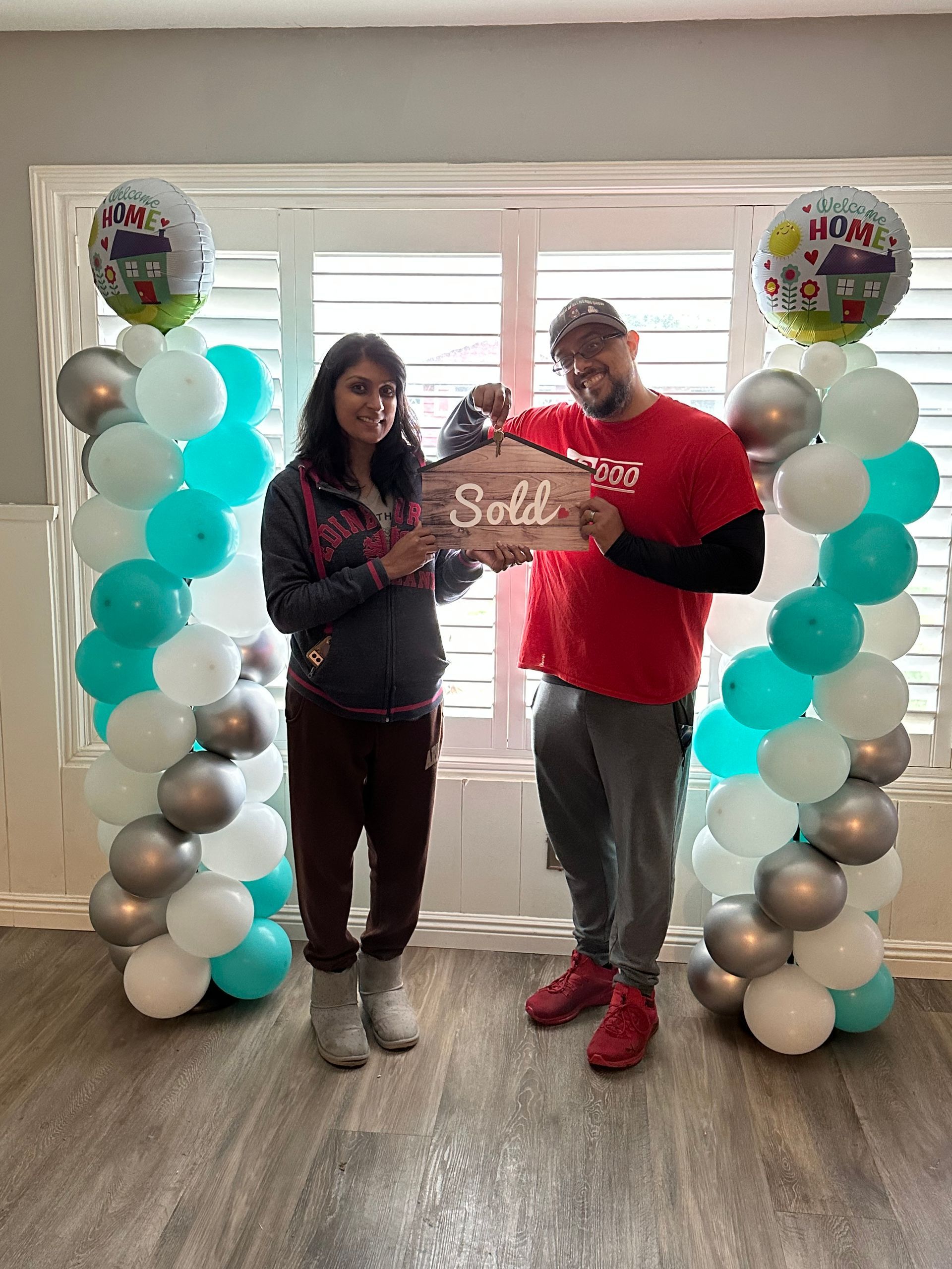 Two people holding a