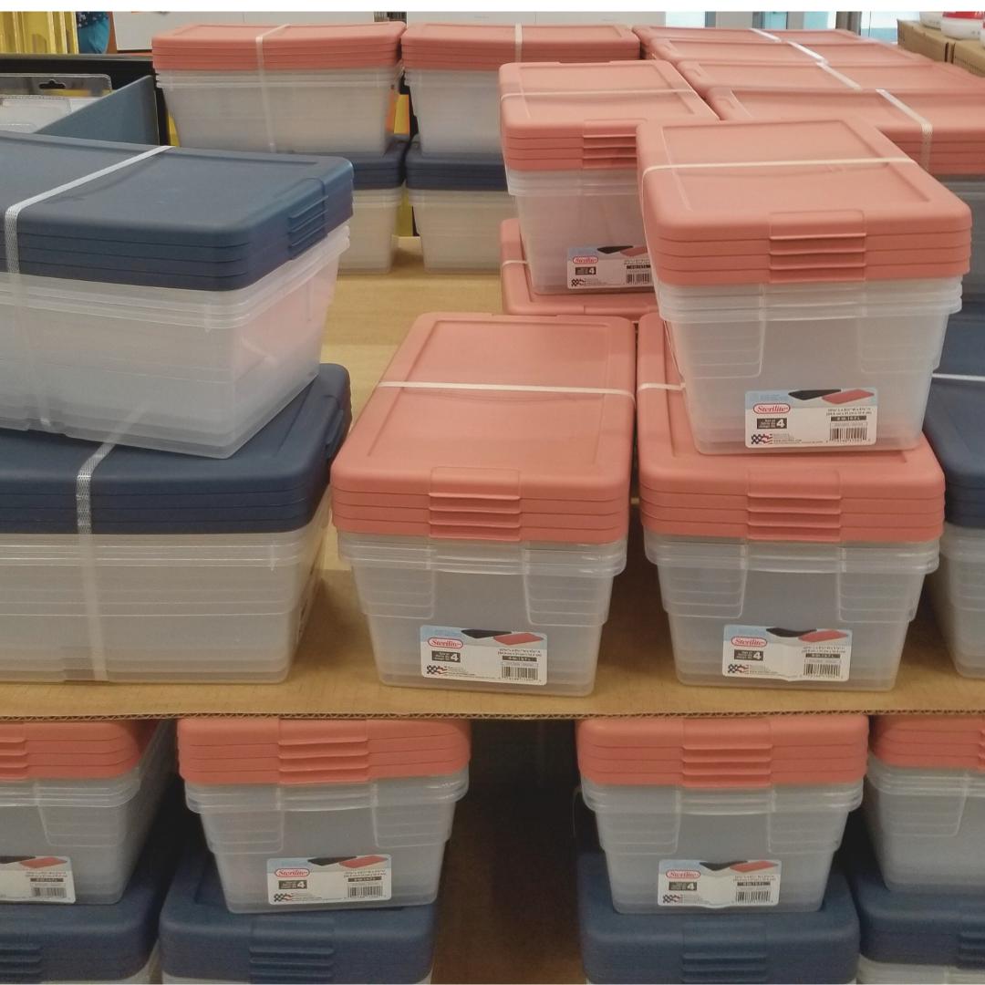 A bunch of plastic containers are stacked on top of each other