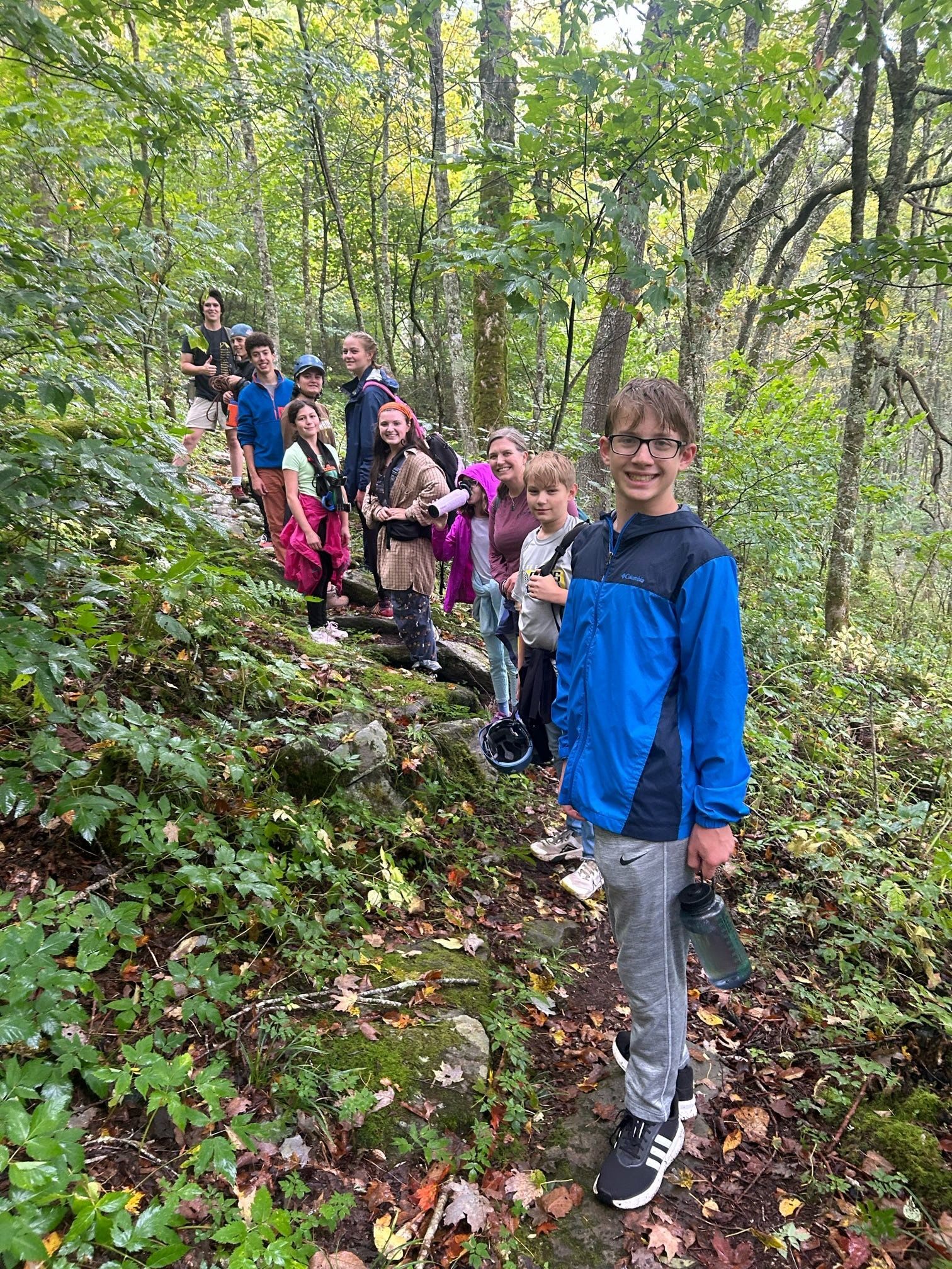 Youth exploring out of doors at Lutherock.