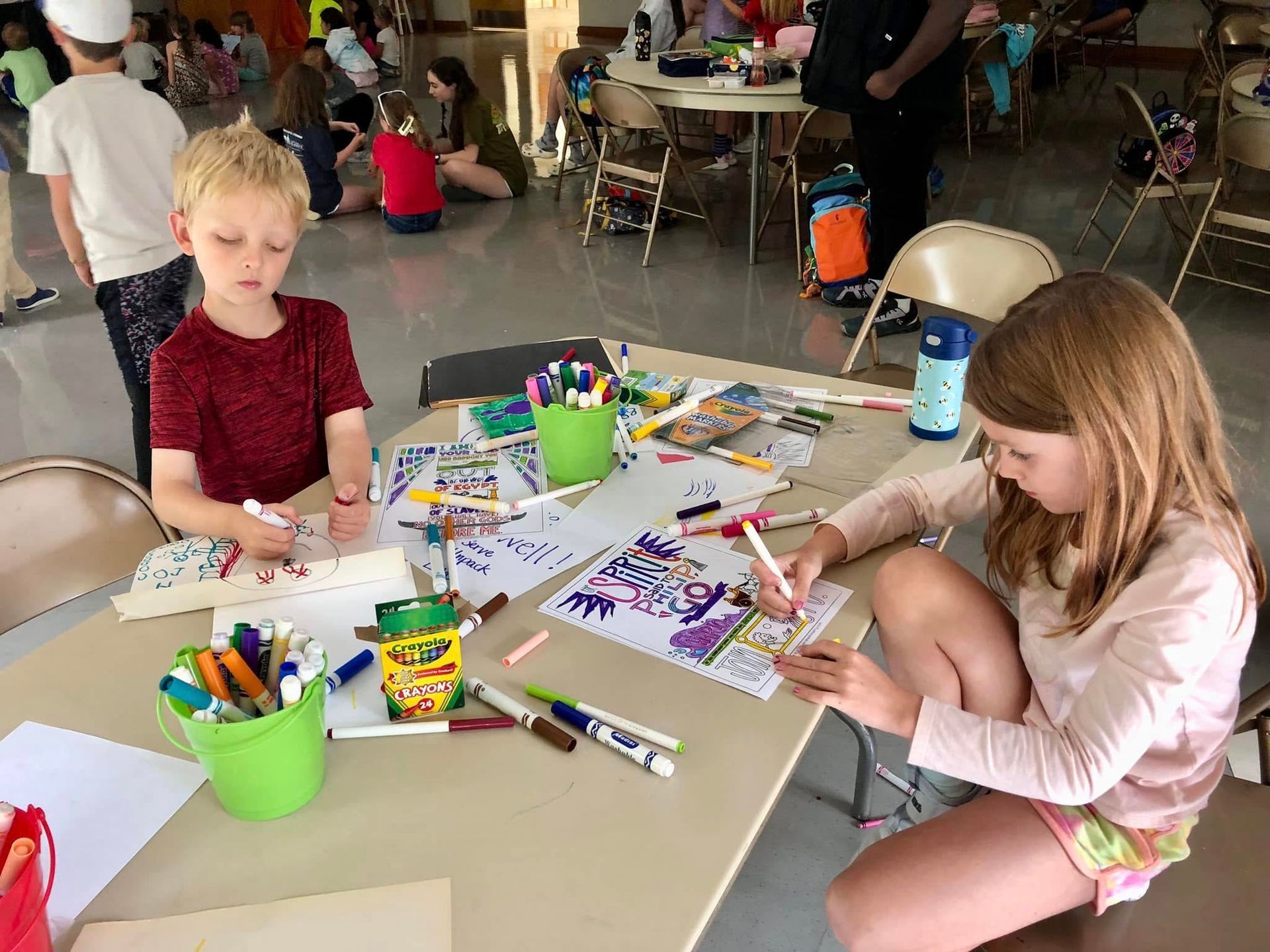 Kids color pages at Lutheroad daycamp.