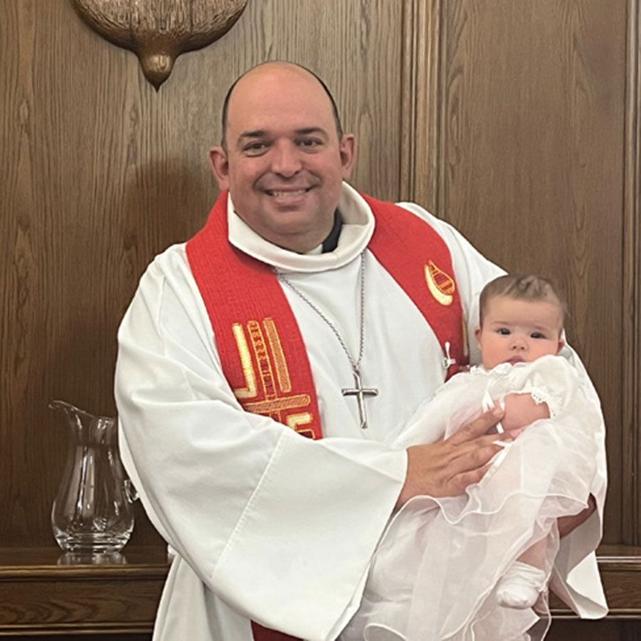 Infant baptism with Pastor Paul.