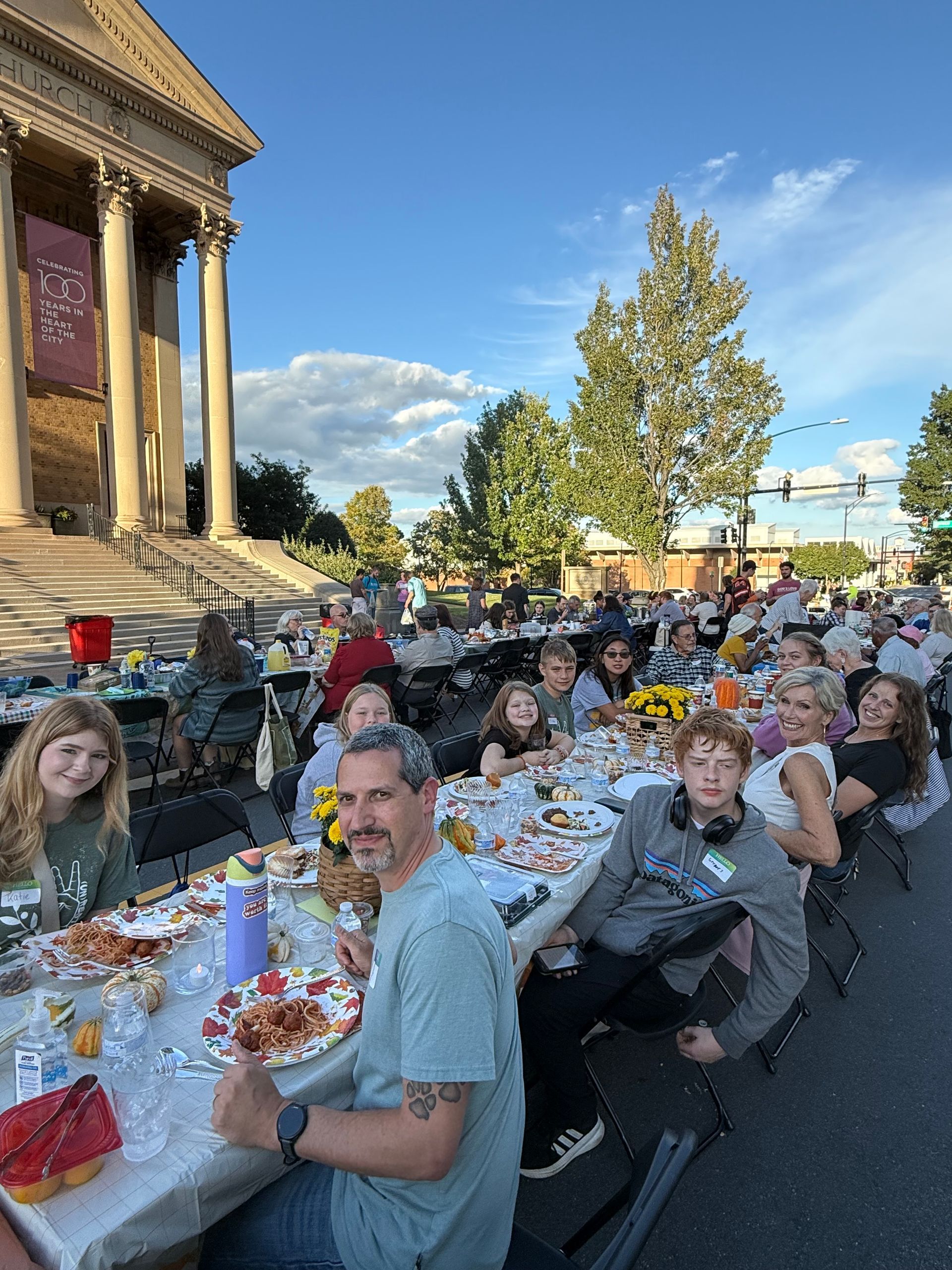 Youth enjoying community meal.