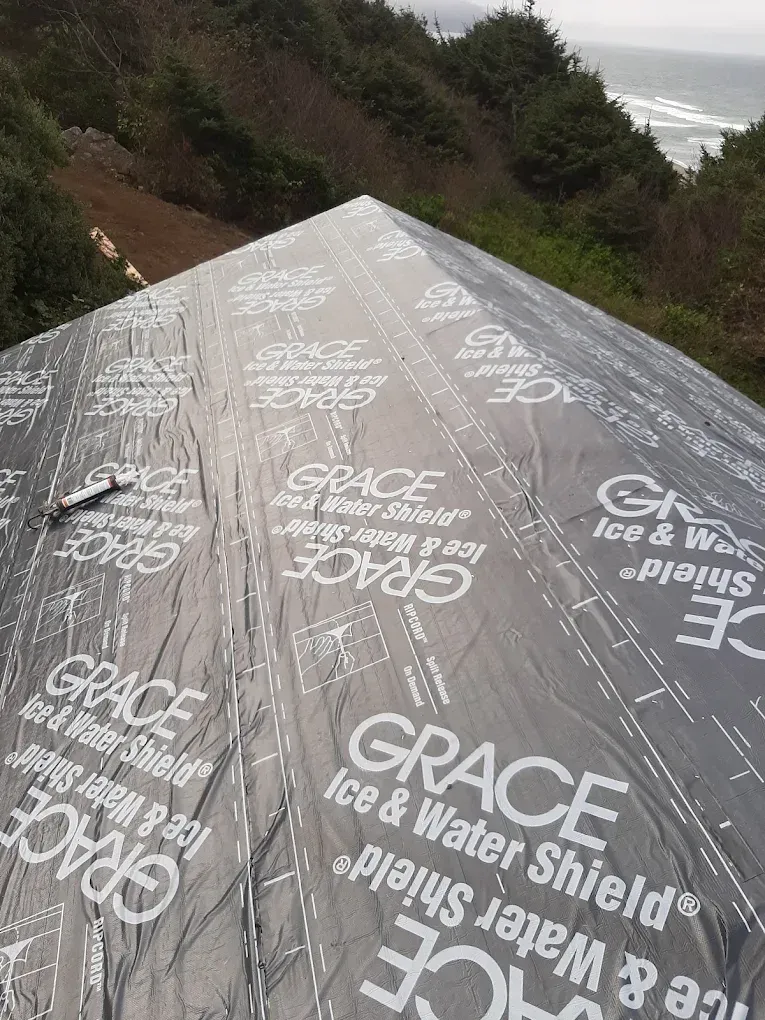 Rooftop covered with Grace Ice & Water Shield membrane, on a hillside overlooking the ocean.