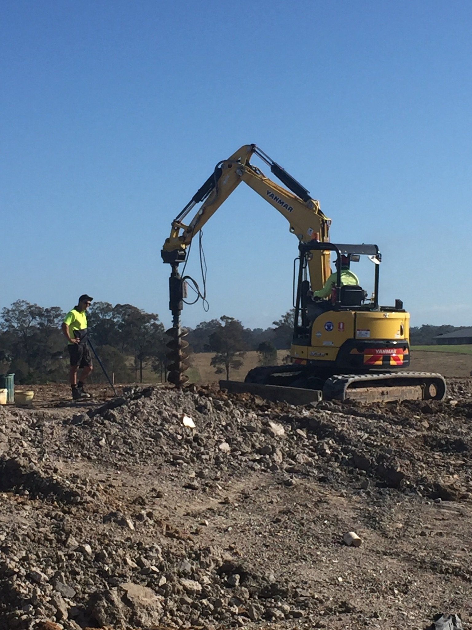 Modern Yellow Excavator Machines - Windsor, NSW - D & M Concrete Services
