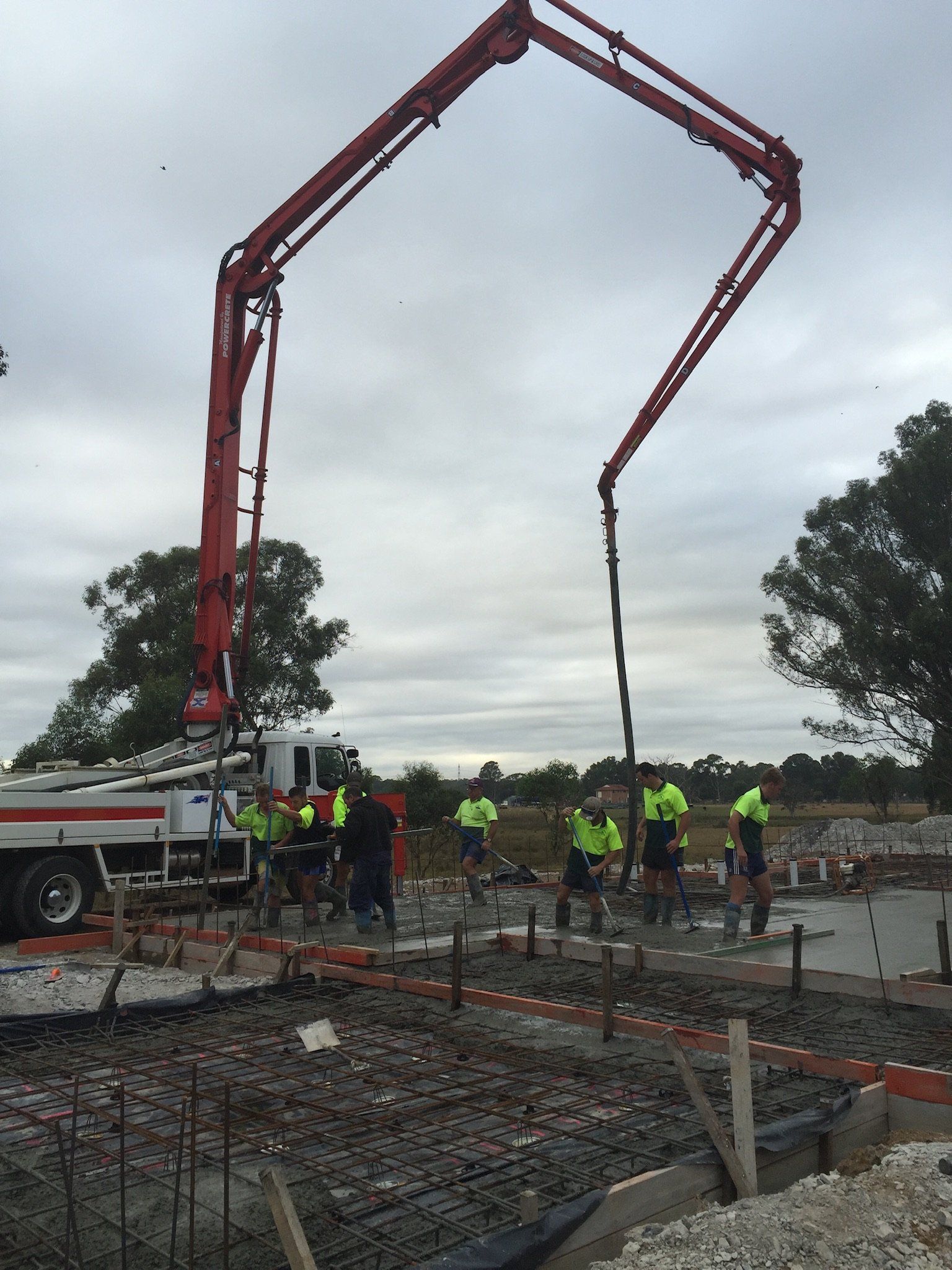Construction Worker Pouring Concrete - Windsor, NSW - D & M Concrete Services
