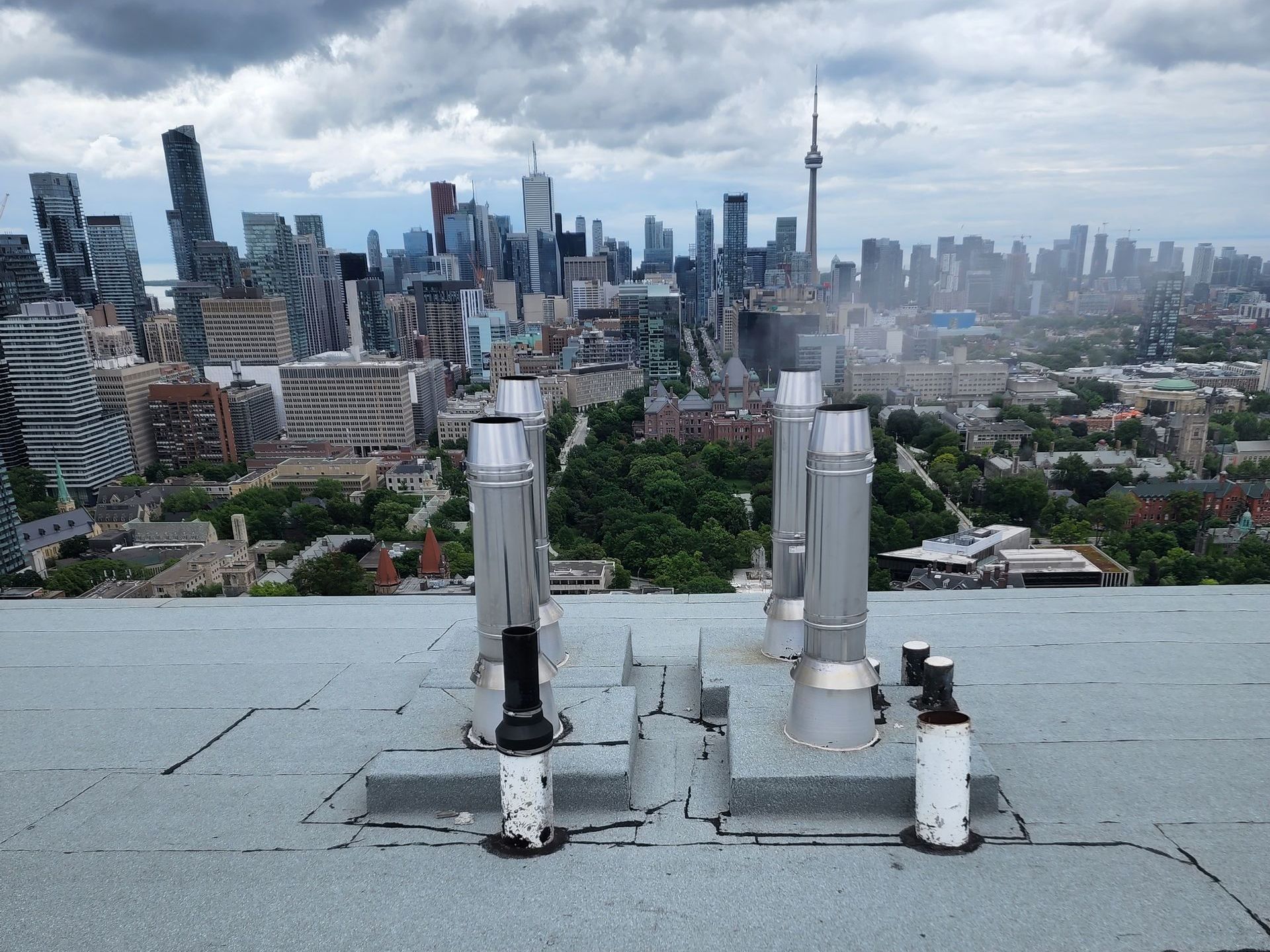 A view of the city skyline from the roof of a building