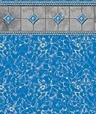 Blue pool water beside patterned gray tile edging with diamond accents