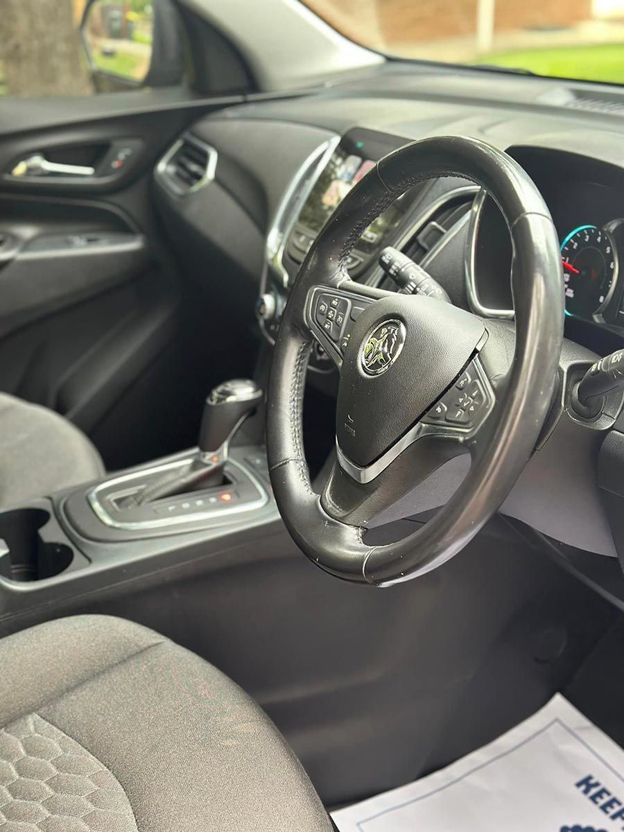 The Inside Of A Car With A Steering Wheel — Brody’s Car Detailing In Tamworth, NSW