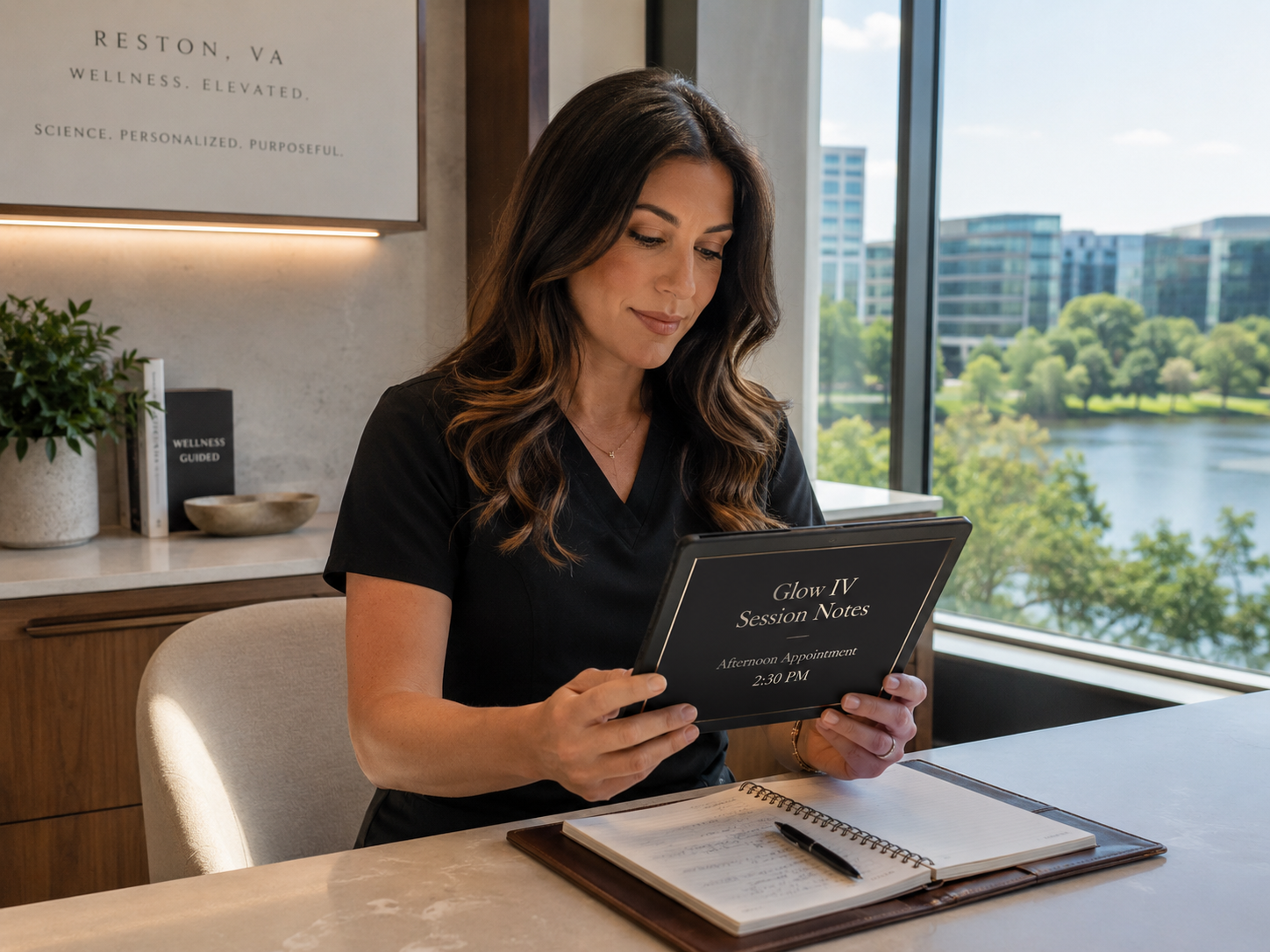 Woman reading a menu at a table by a large window overlooking water and buildings.