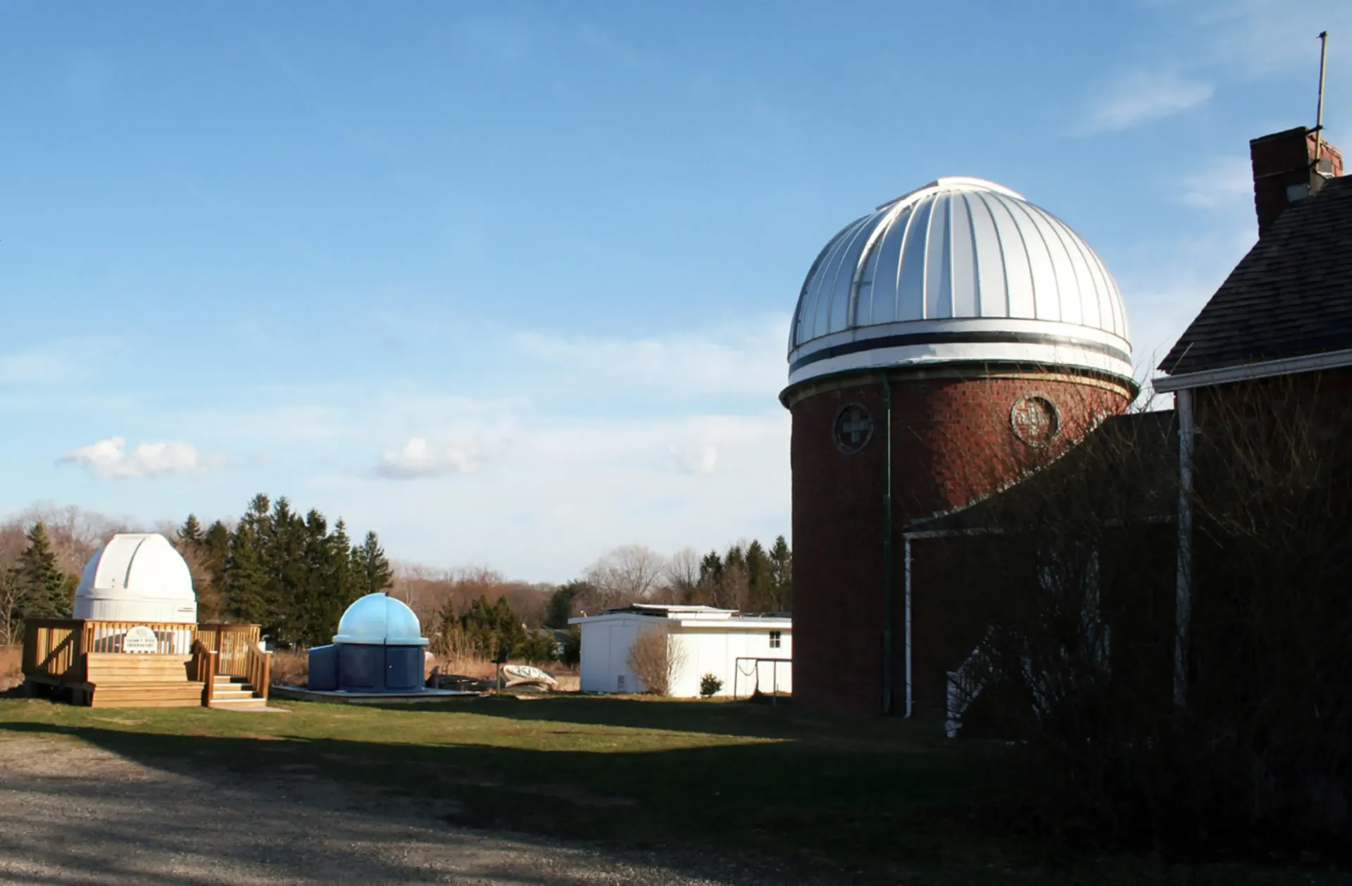 A brick building with a dome on top of it