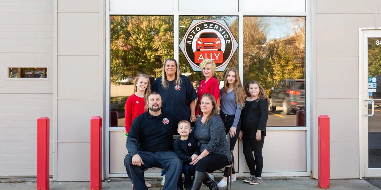 family near gate  | Ally Auto Service