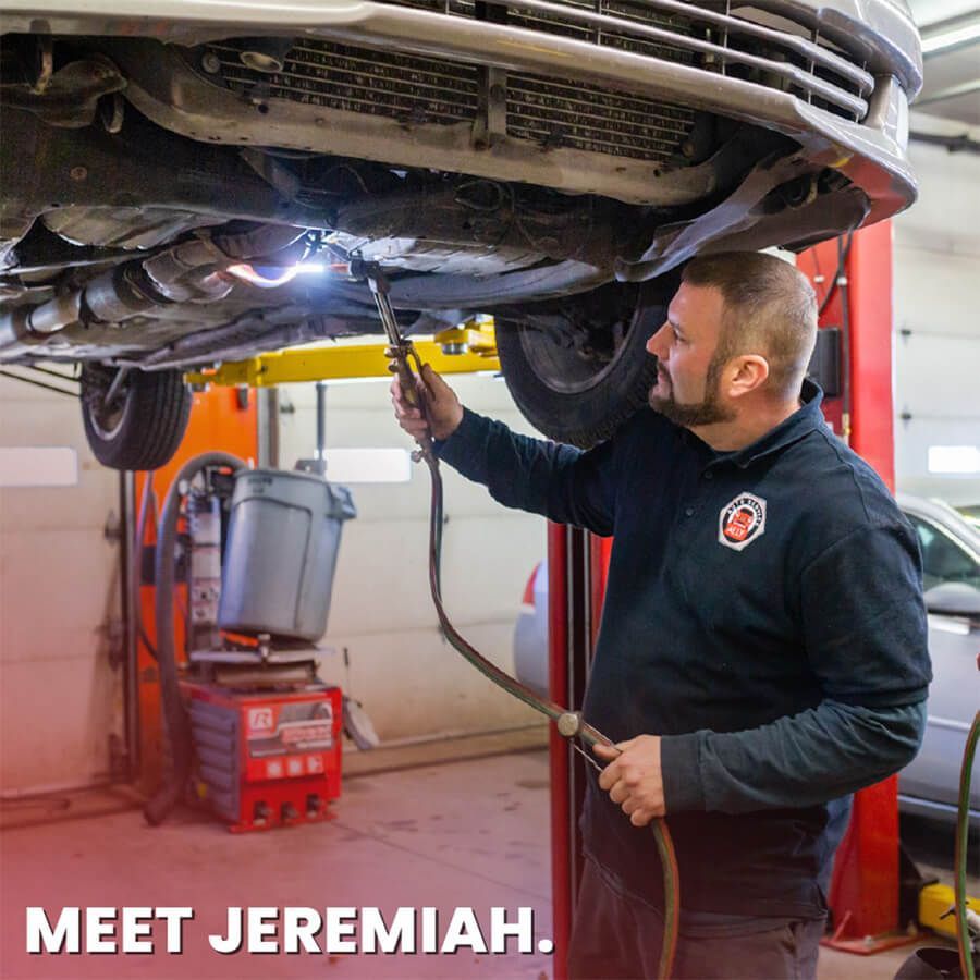 a man washing a car | Ally Auto Service