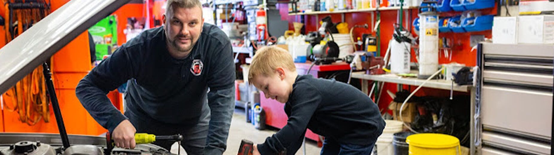 A little child  repairing car engine | Ally Auto Service