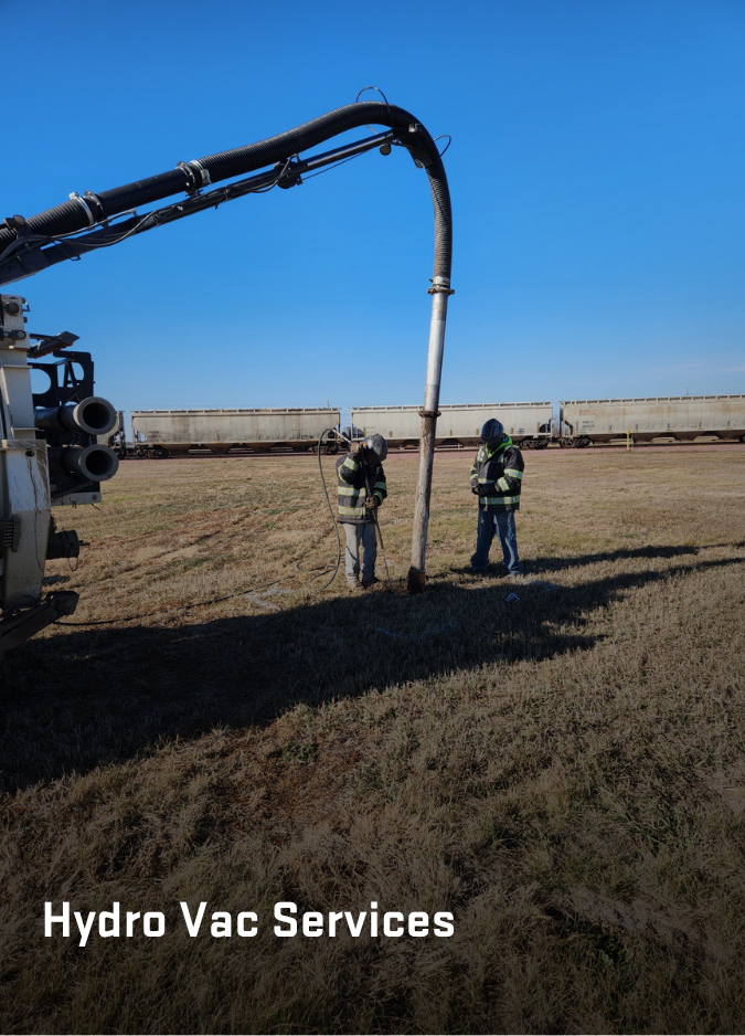 Two workers operate industrial hydro-excavation equipment in an open field near a train, with text overlay at the bottom.