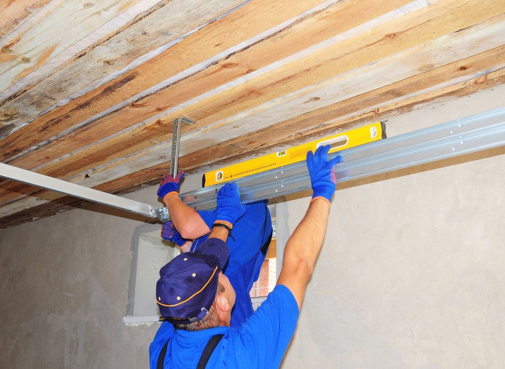 Installing Garage Door Metal — Garage Door Repairs in Marcoola QLD