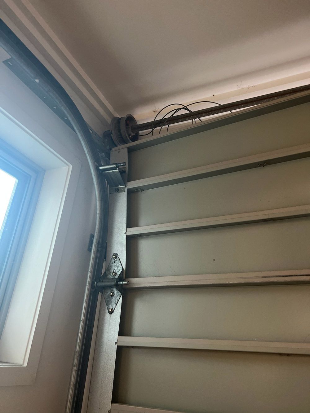 Hinge on Garage door — Garage Door Repairs in Marcoola QLD