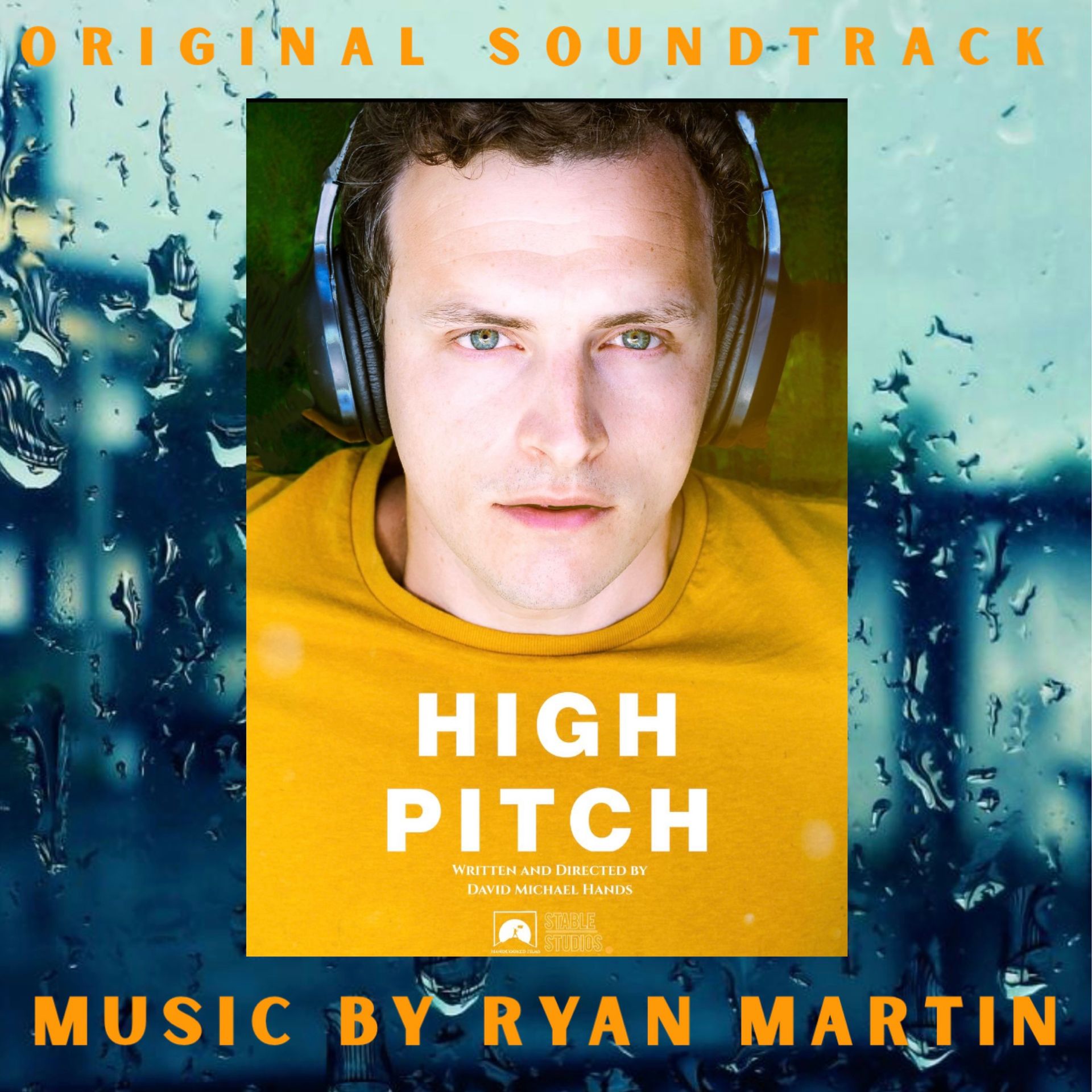 Album cover: Man wearing headphones, centered on a green/blue background with the words 