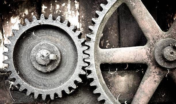 Large Cogs on Redundant Farm Machinery