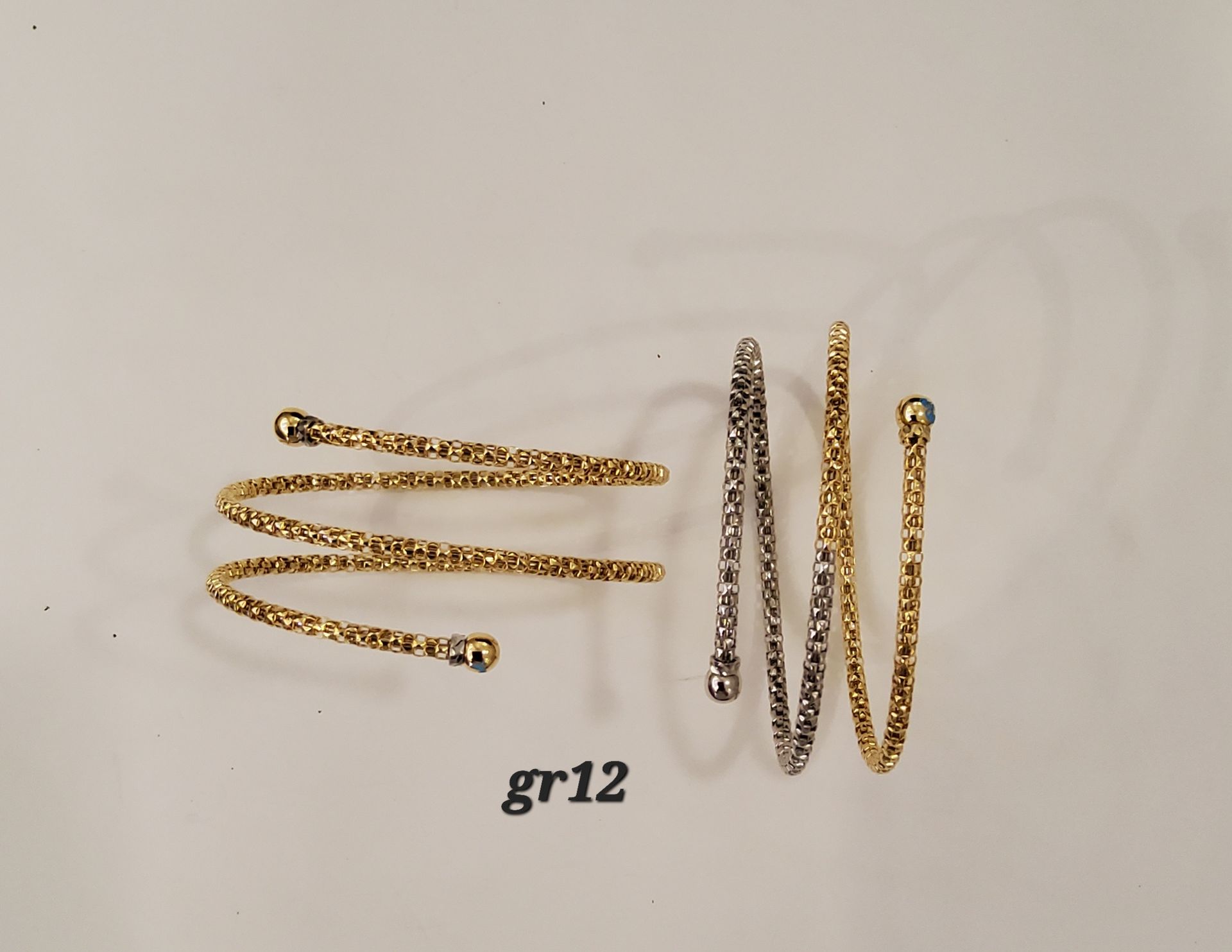 BRACCIALE AVVOLGENTE TREGIRI  ORO 18K 