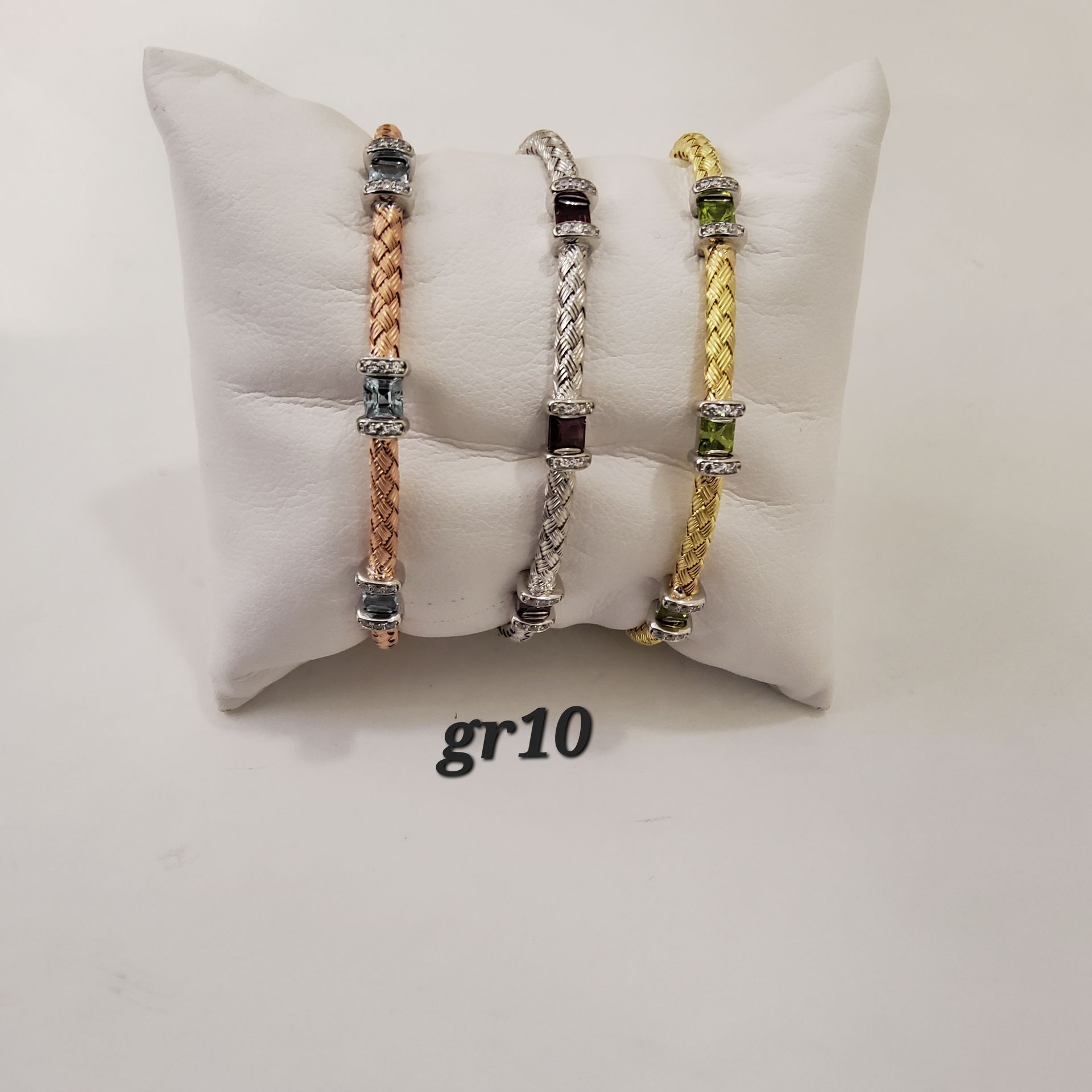 BRACCIALI CON PIETRE ORO 18K