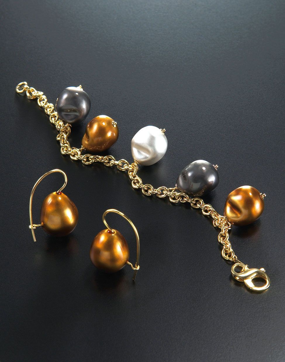 BRACCIALE CON PERLE NATURALI  BAROCCHE ORO 18K GIALLO 