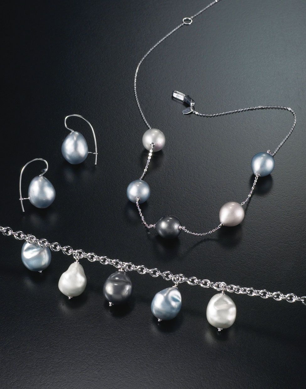 ORECCHINO E COLLANA CON PERLE NATURALI  BAROCCHE ORO 18K BIANCO