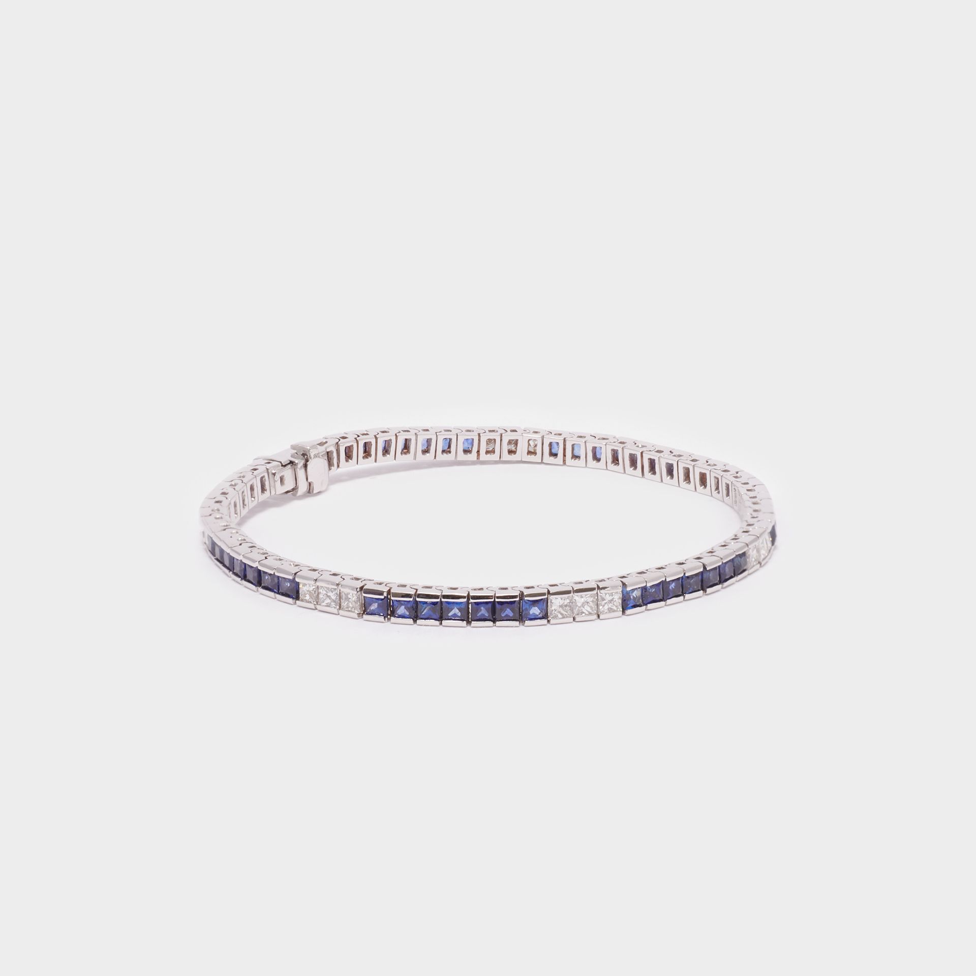 BRACCIALE TENNIS CON DIAMANTI E ZAFFIRI 18KT