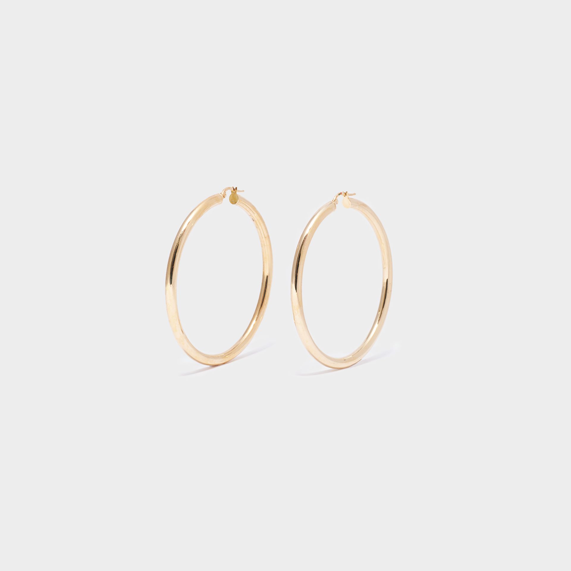 ORECCHINI 18 KT TUBO CERCHIO