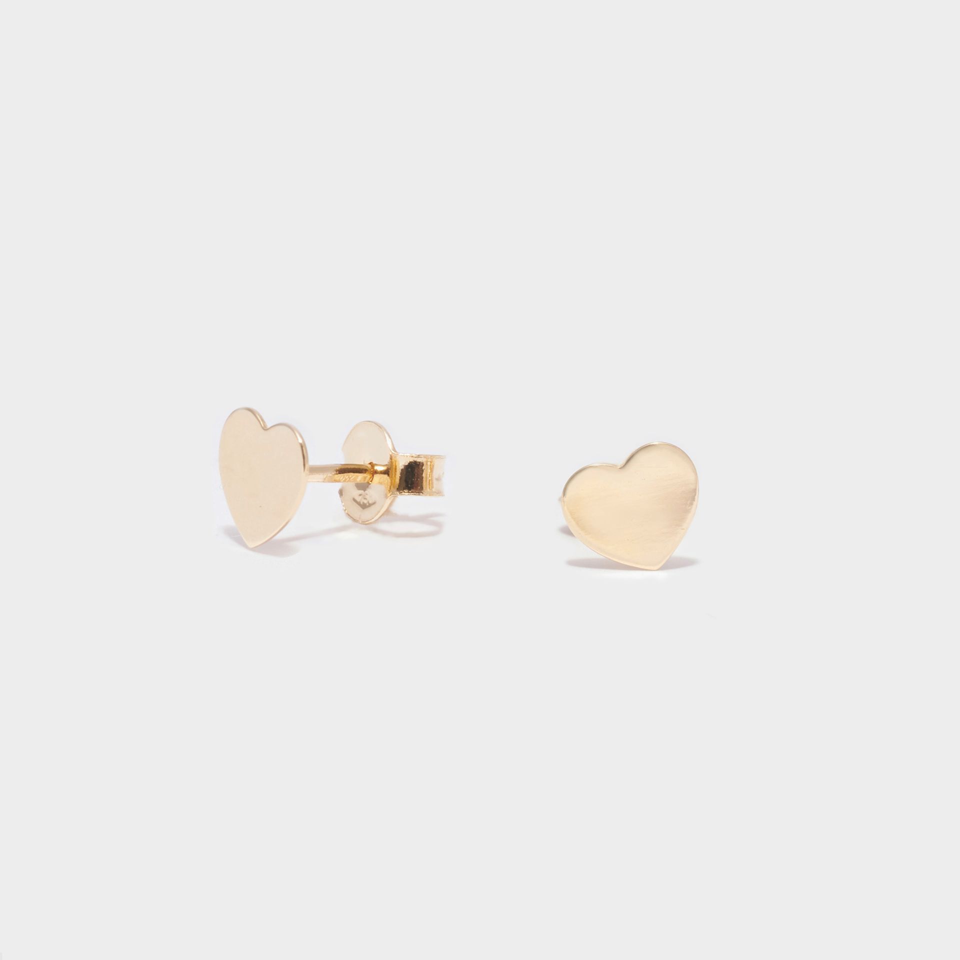 ORECCHINI 18 KT STAMPATO FORMA CUORE CHIUSURA FARFALLINA