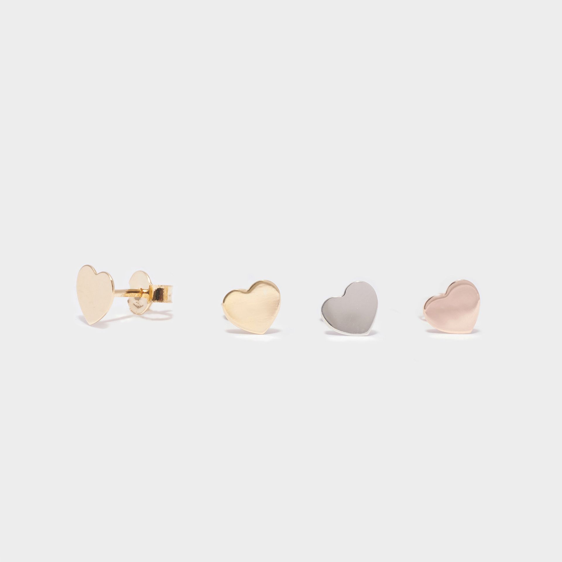 ORECCHINI 18 KT STAMPATO FORMA CUORE CHIUSURA FARFALLINA