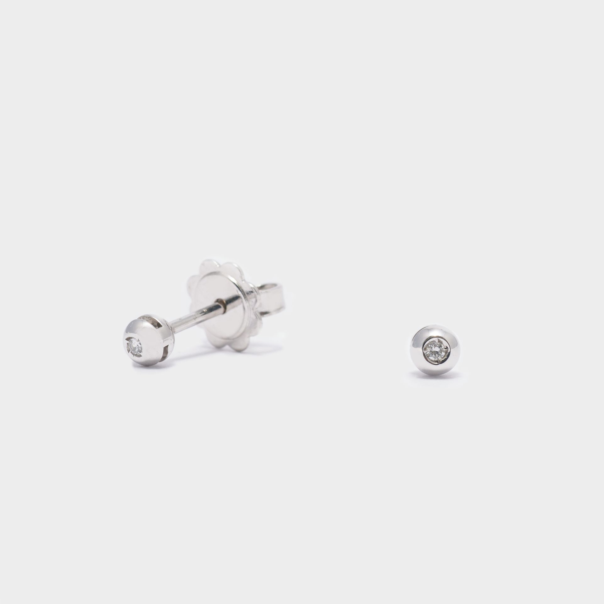 ORECCHINI 18KT A LOBO  PUNTO LUCE CON  DIAMANTE 