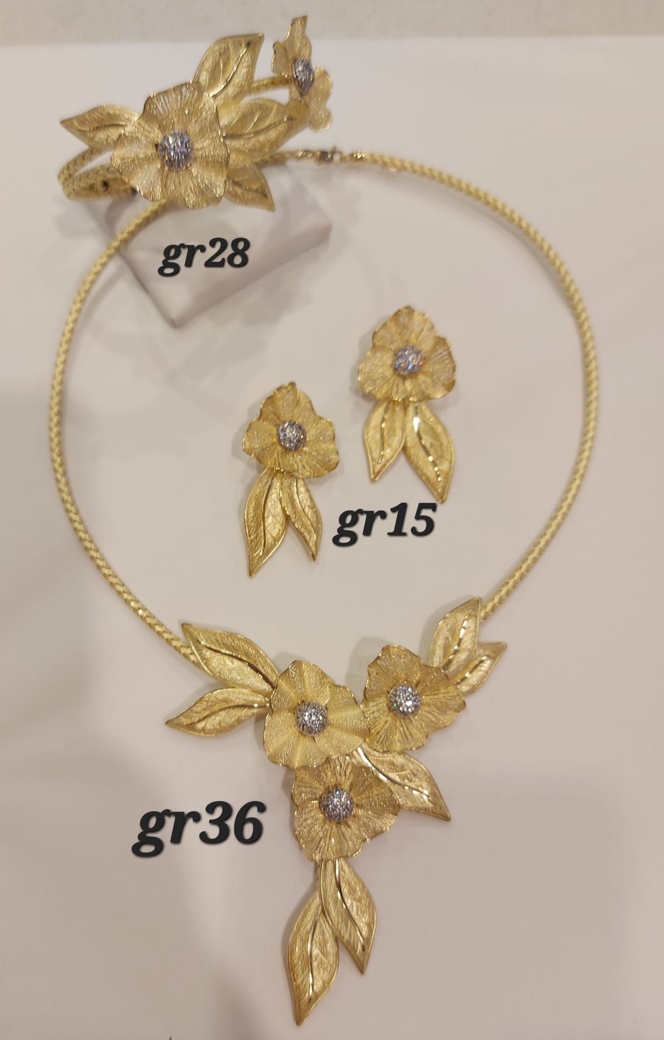 PARURE CON COLLANA, BRACCIALE E ORECCHINI ORO GIALLO 18K 
