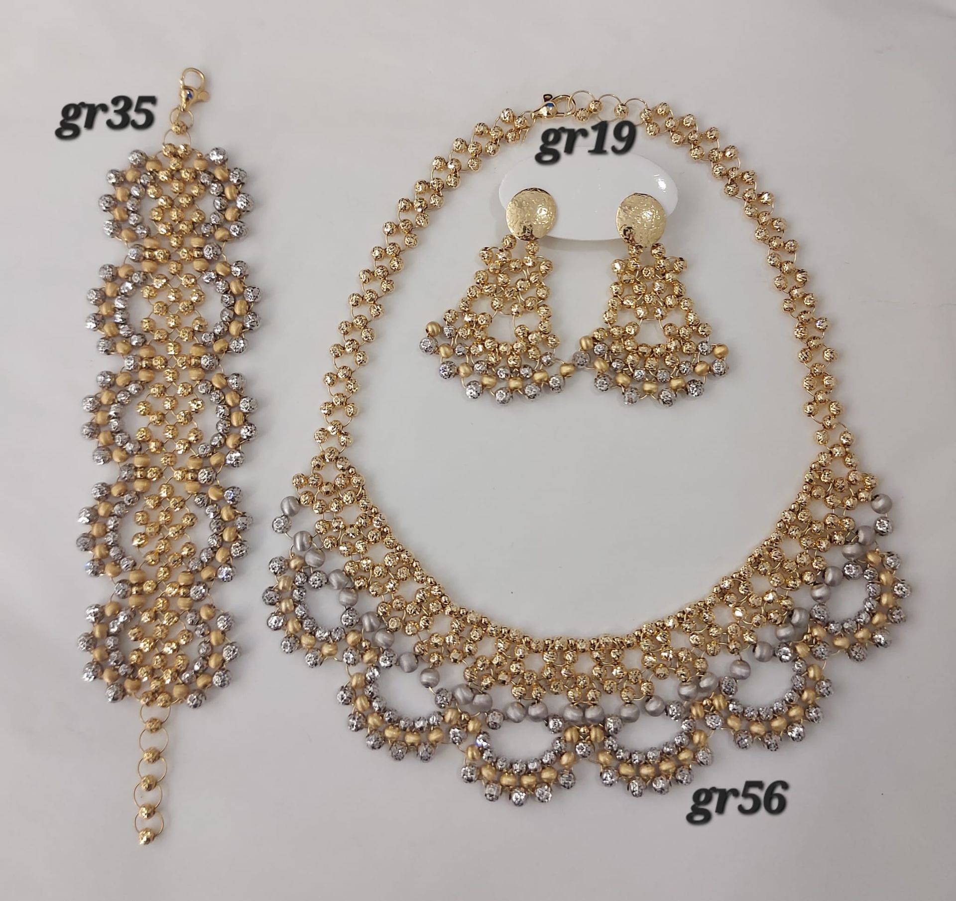 PARURE ORO 18KT COLLANA, ORECCHINI  E BRACCIALI