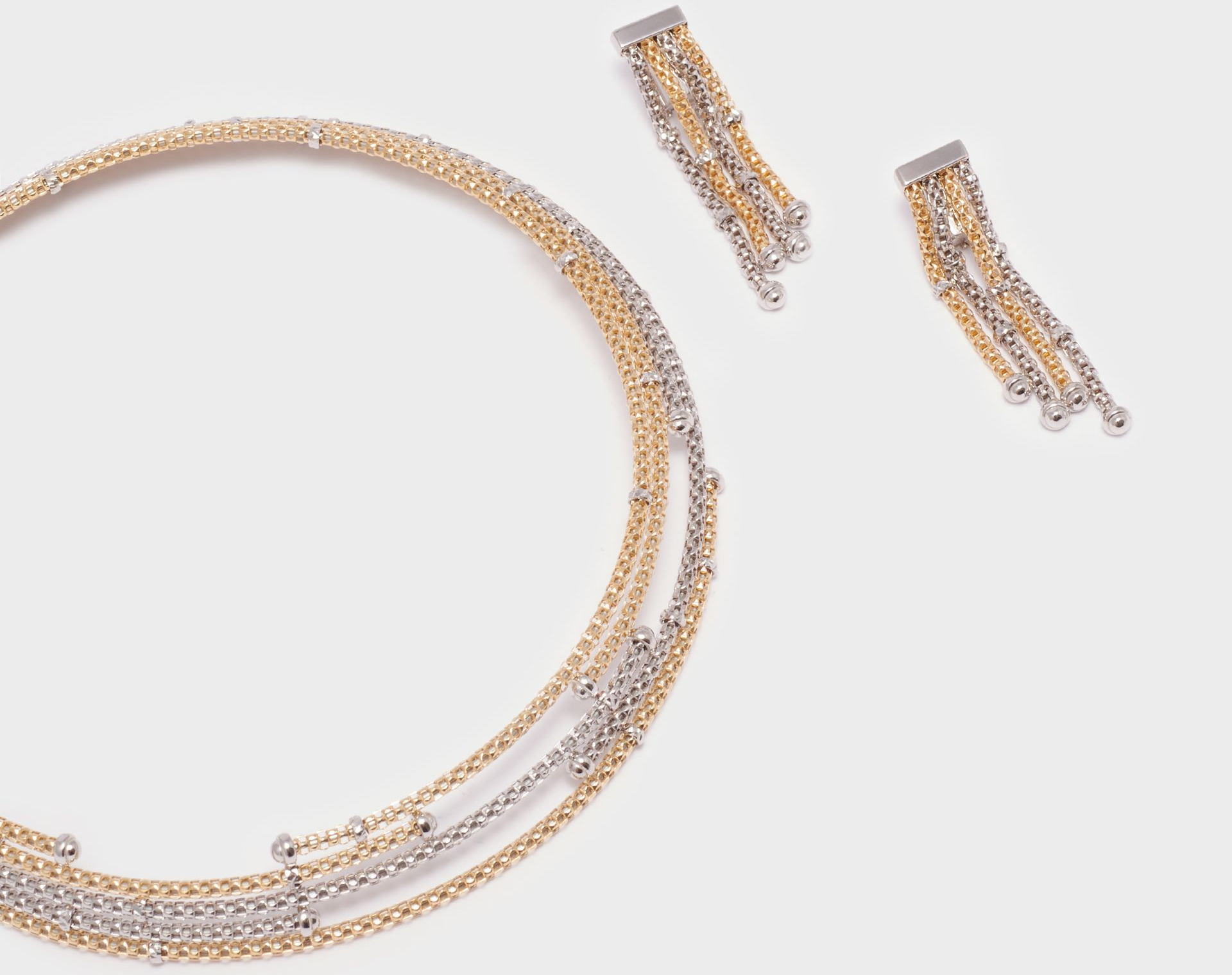 PARURE BICOLORE COLLANA CON  ORECCHINI ORO 18 KT
