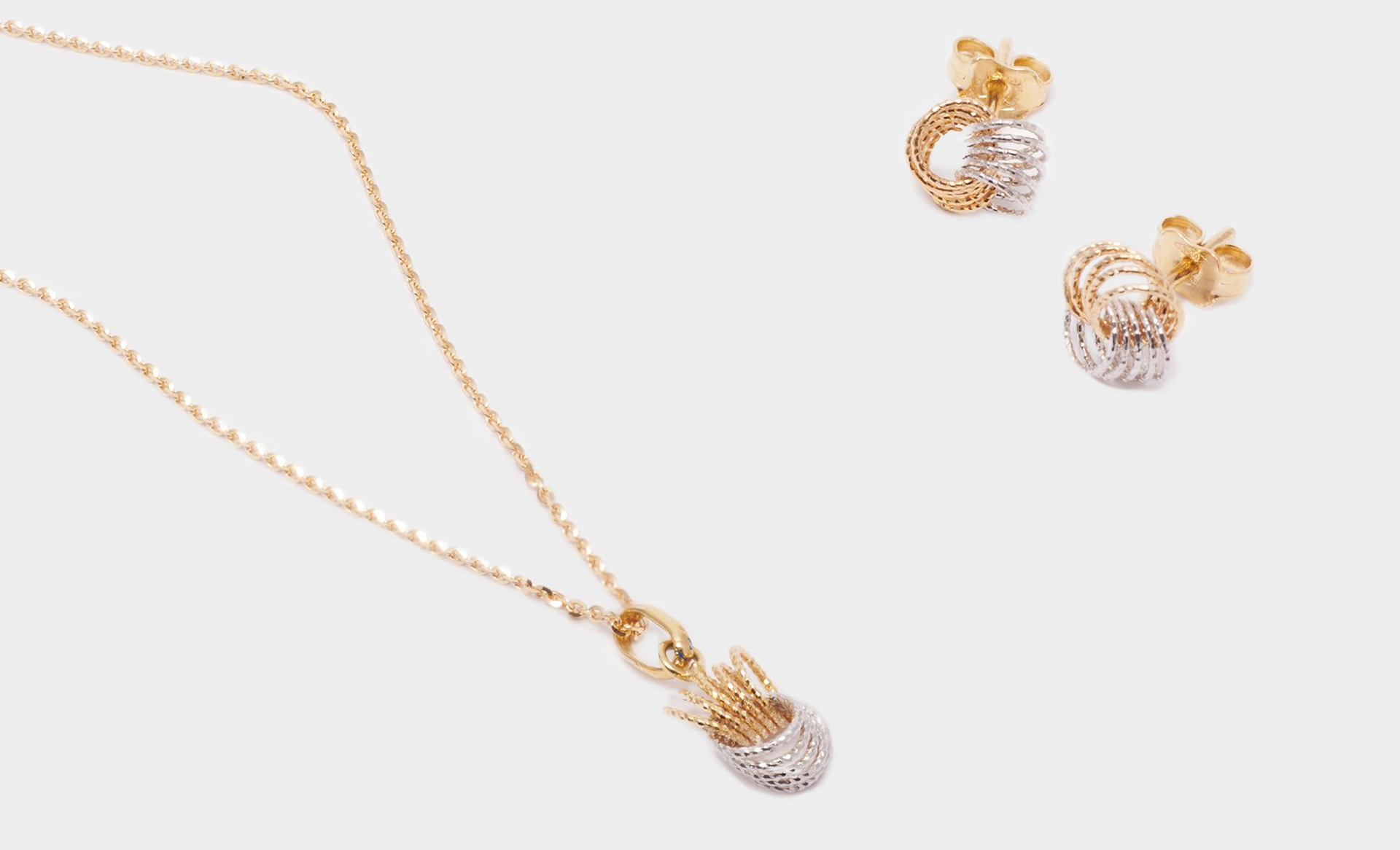 PARURE CON ORECCHINI  E PENDENTE ORO 18K  BIANCO E GIALLO
