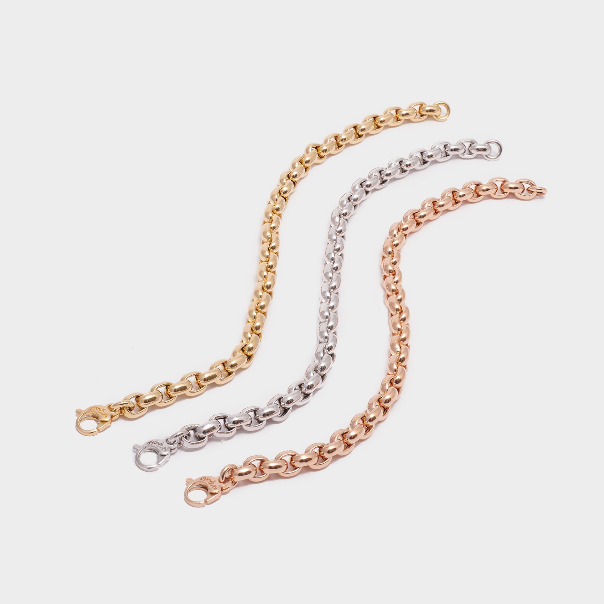 TRIS BRACCIALI ORO ROSA, BIANCO E GIALLO 18 KT