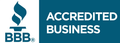 A blue sign that says accredited business on it