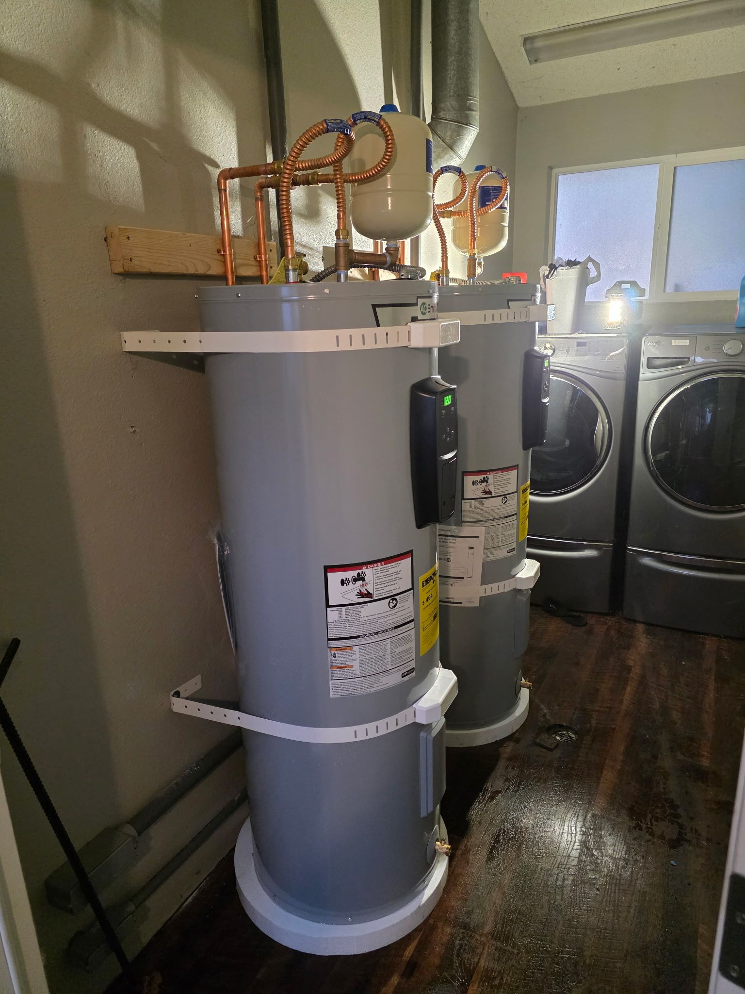 Replacement double water heater unit in a Kitsap County duplex