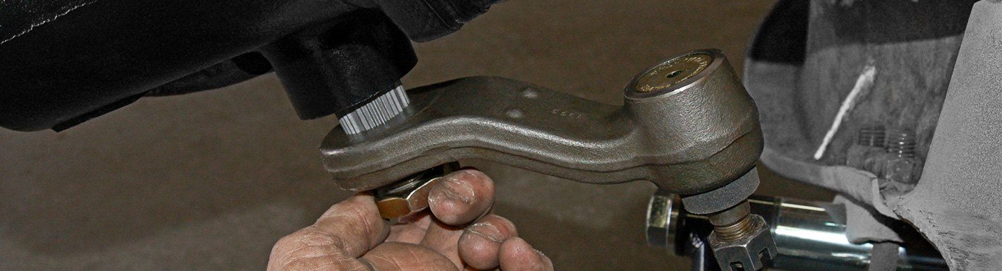 A person is holding a piece of metal in their hand.