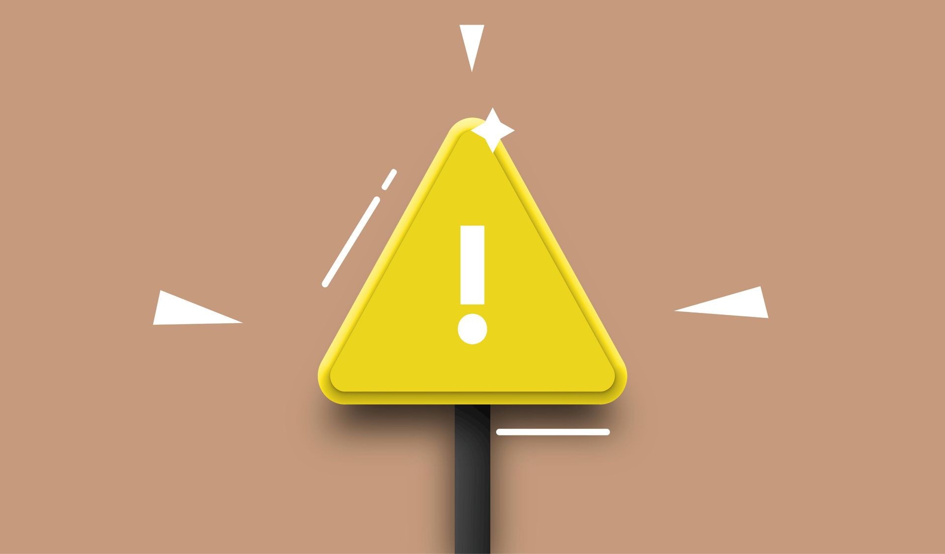 Yellow warning sign with an exclamation point on a brown background.