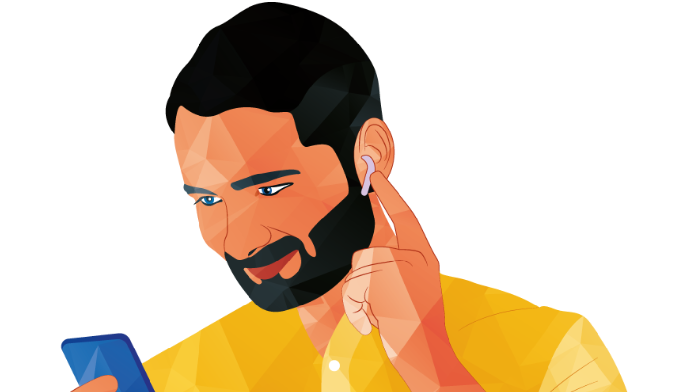 Man with beard wearing earbuds, looking at a blue phone, smiling in a yellow shirt.