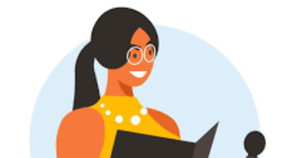 Woman with glasses reading from a book at a podium. She smiles, and is wearing a yellow top.