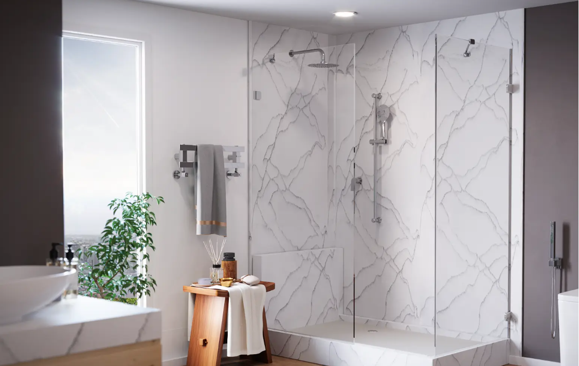 Modern bathroom with marble shower, white tub, and a plant by the window