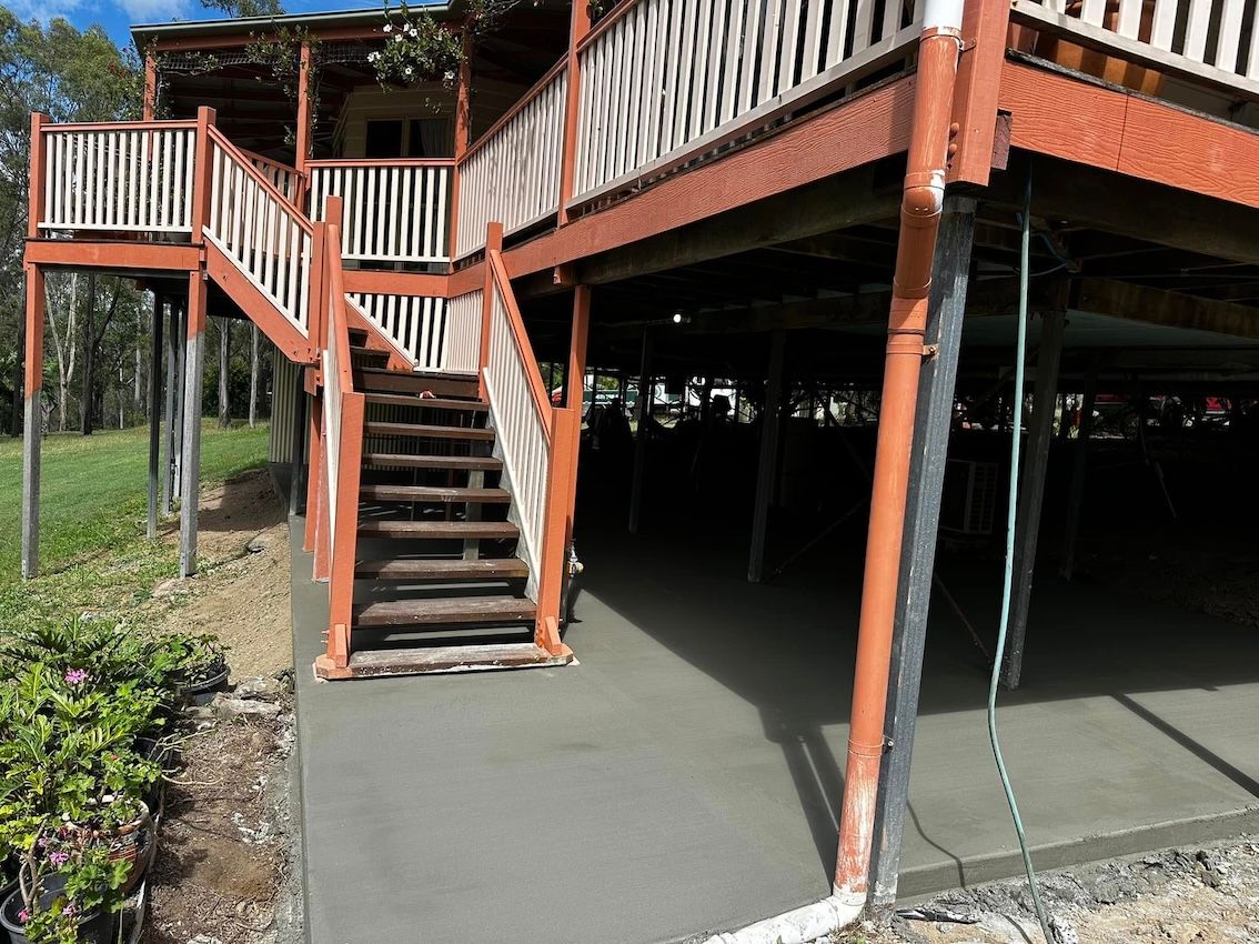 Freshly Laid Concrete Under Double Story House — Crete to Coast Concreting in Tamborine Mountain, QLD
