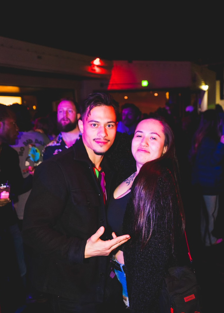 A man and a woman are posing for a picture at el patio in denver colorado
