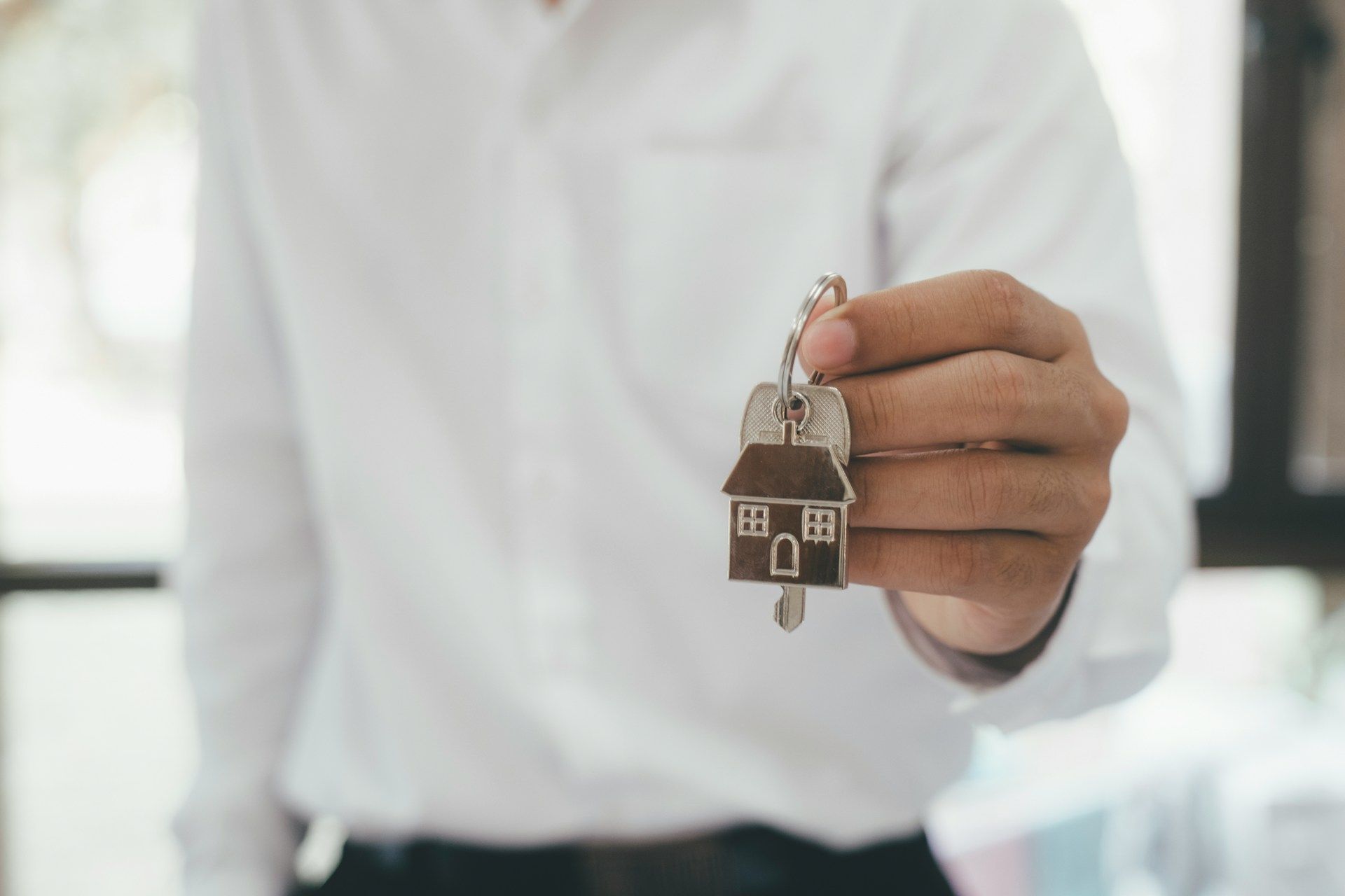 landlord handing house key