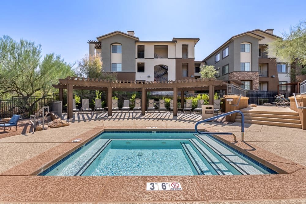 Apartment community spa in front of the apartment building at Marquis Sonoran Preserve in Norterra Phoenix, AZ.