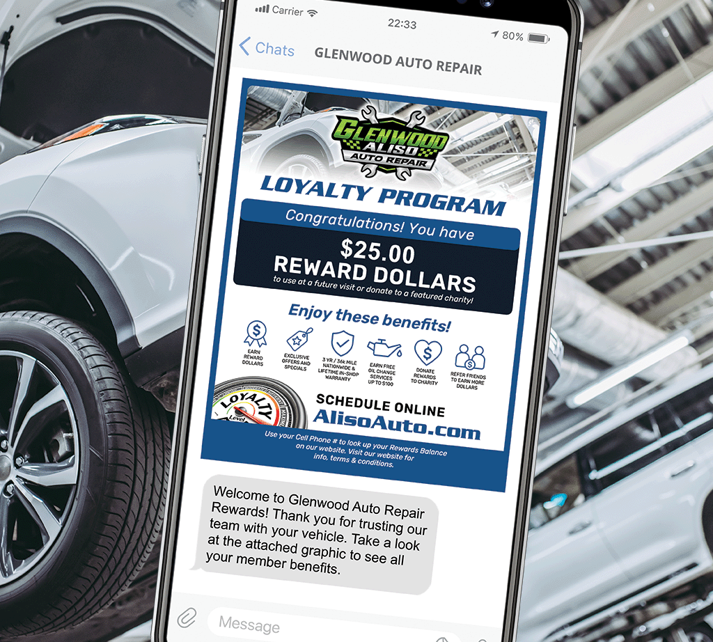 Phone showing auto repair reward program poster in a car shop, with $25 reward dollars and service logos.
