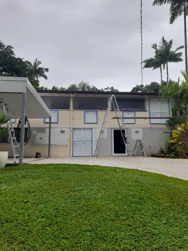 A House That Is Being Painted With A Ladder In Front Of It — Kiwi Painter In Mooroobool, QLD