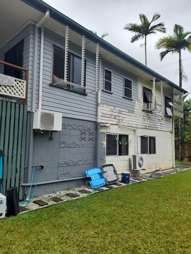 A Before And After Photo Of A House With A Garage — Kiwi Painter In Mooroobool, QLD